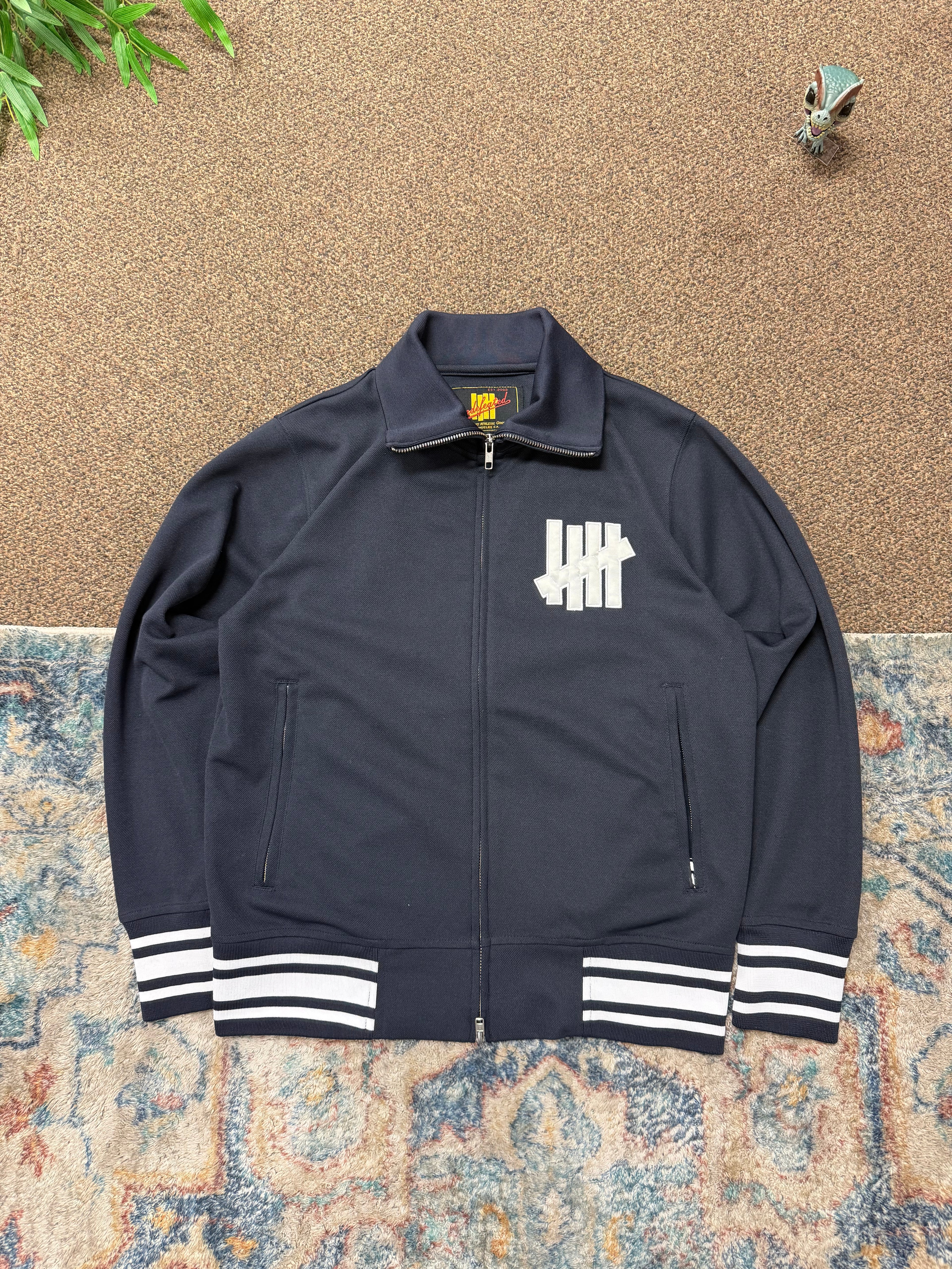 Undefeated Double Zipper Track Jacket