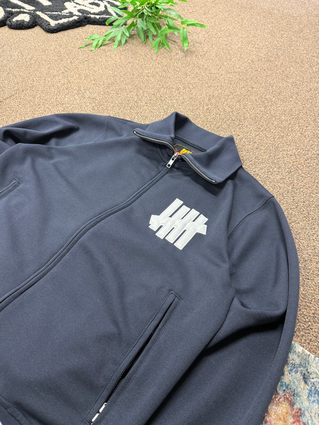 Undefeated Double Zipper Track Jacket