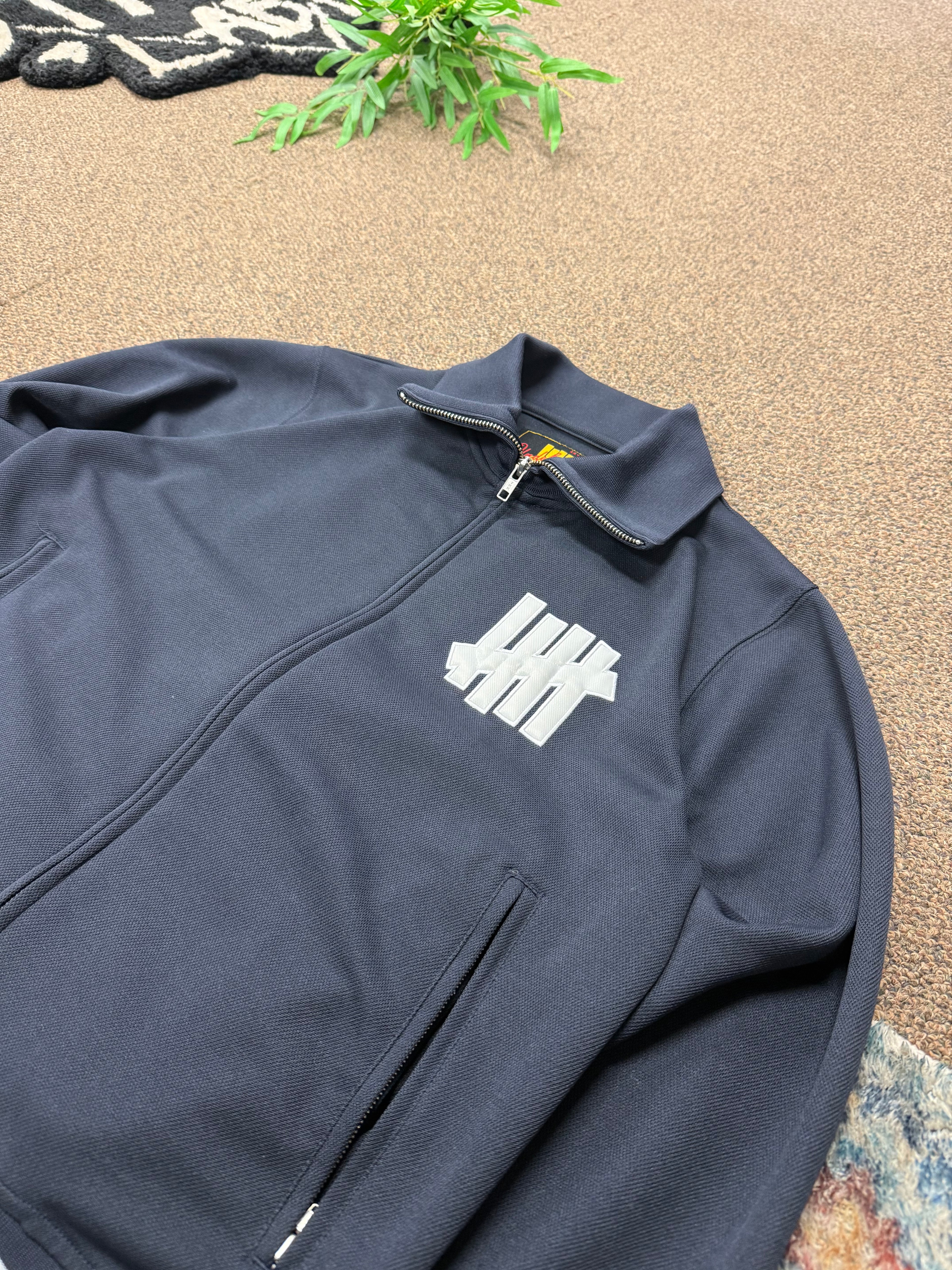 Undefeated Double Zipper Track Jacket